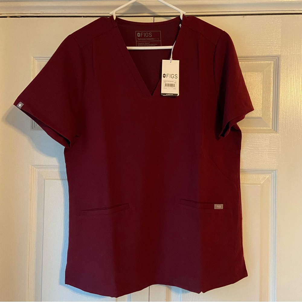 FIGS burgundy scrub top. NWT
